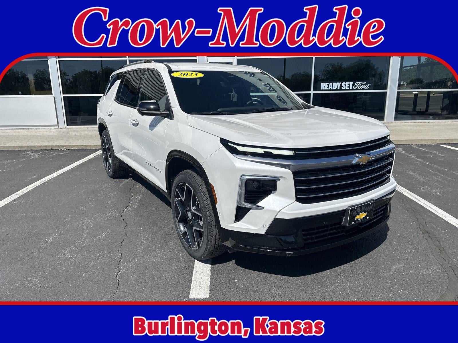 2025 Chevrolet Traverse High Country in Iridescent Pearl Tricoat — front three-quarter view