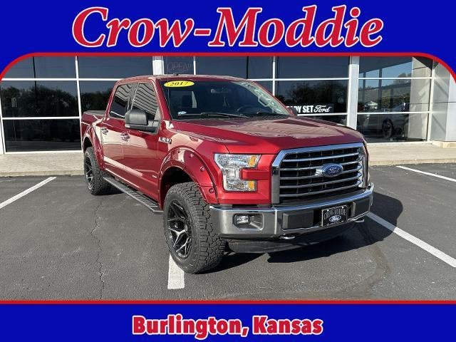 2017 Ford F-150 XLT 4WD SuperCrew 5.5' Box in Ruby Red Metallic Tinted Clearcoat — front three-quarter view